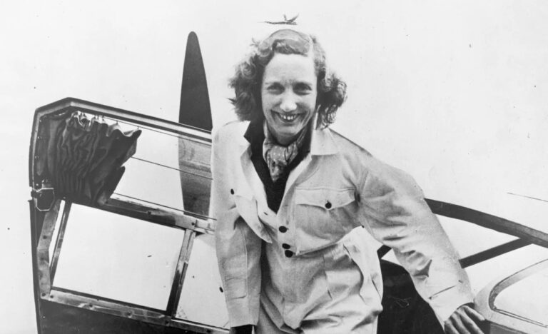 Beryl Markham stepping out of an aircraft, capturing the essence of her adventurous spirit and groundbreaking achievements in aviation.